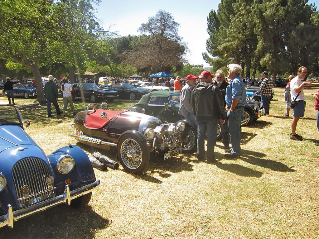 Jay Leno talks shop with a few of the patrons at this year's Queen’s English All British Car Show.