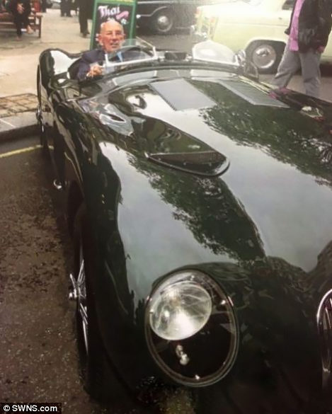 Sterling Moss in Dr. James Hulls' Jaguar C-Type.